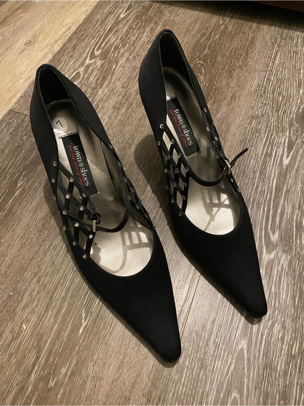 Black Pointed-Toe Heels with Studded Lattice Straps